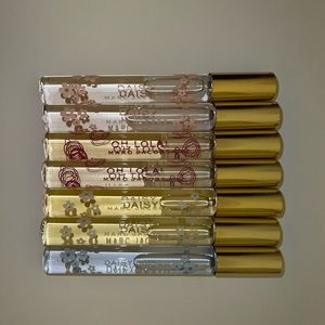Set of 7 Marc Jacobs fragrance rollers.